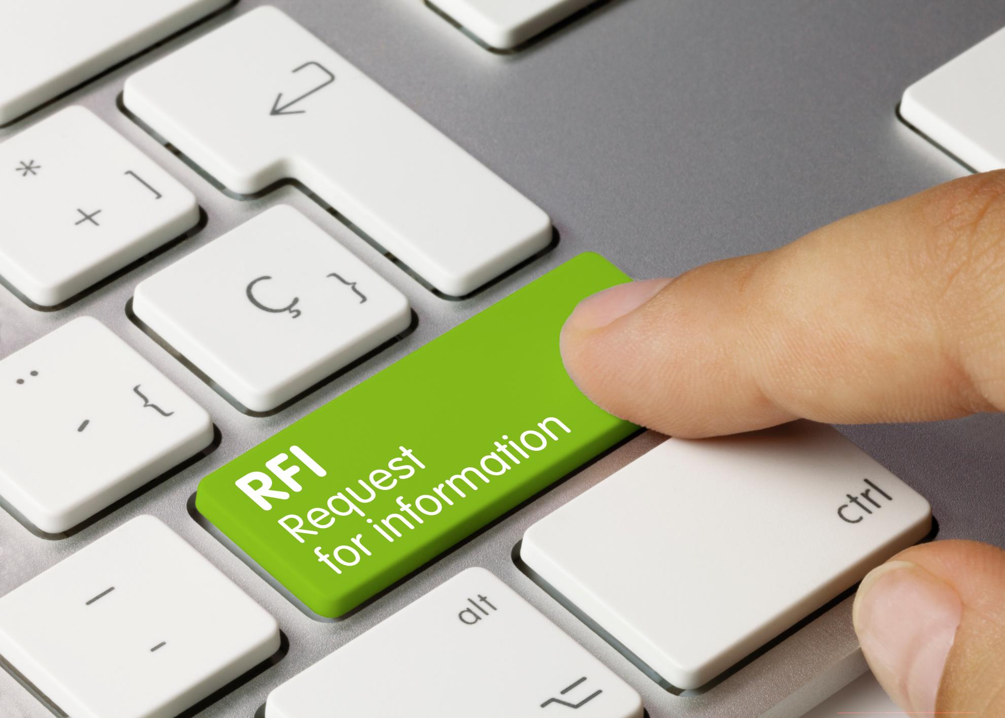 A finger presses a button labeled RFI (Request for Information)